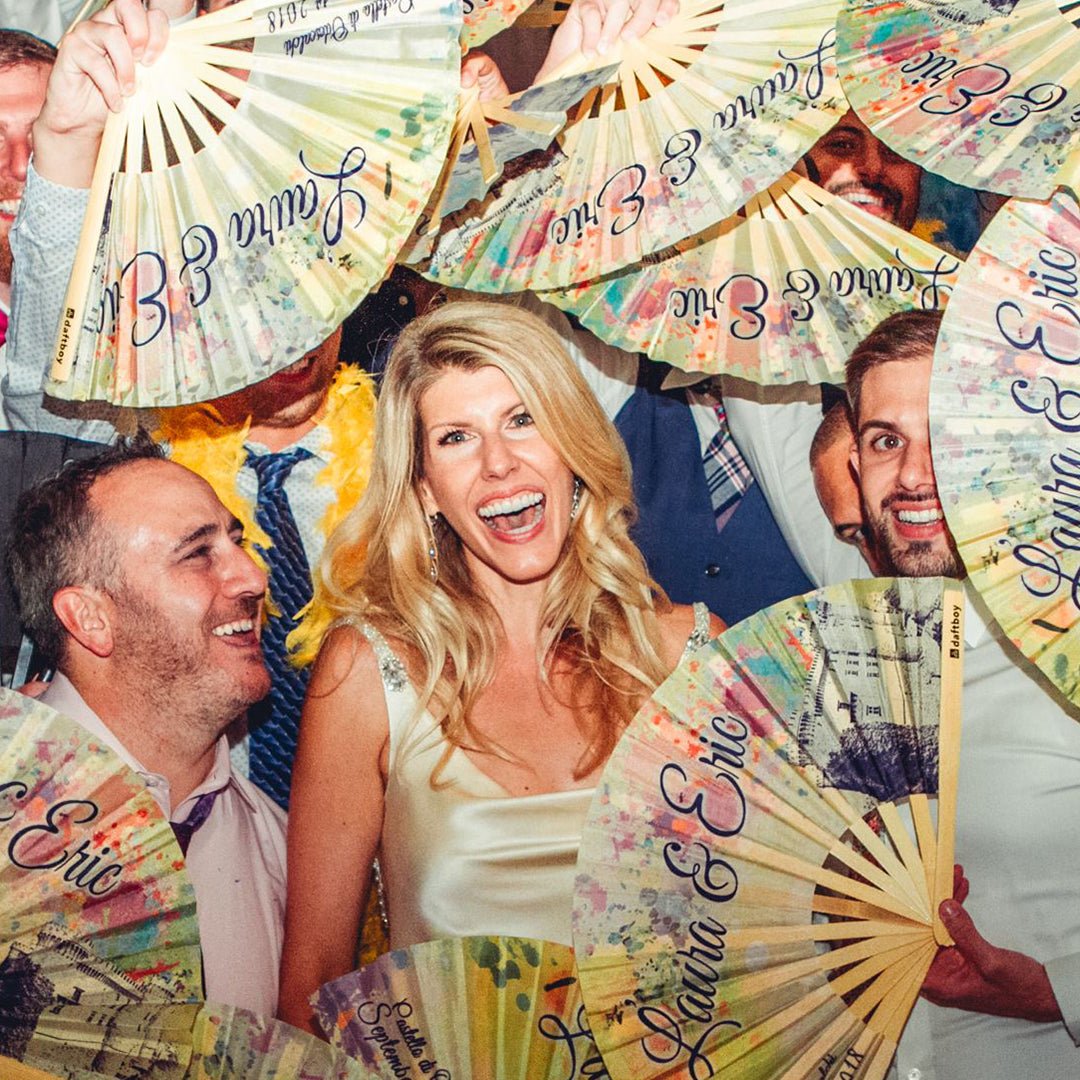 Wedding guests with custom Daftboy fans