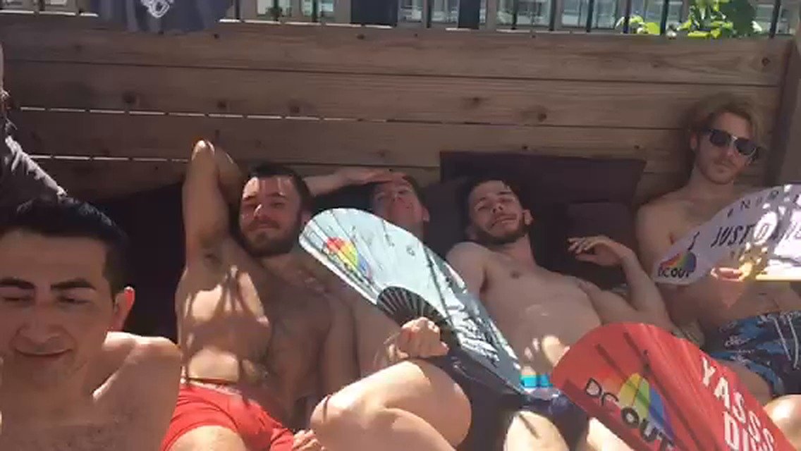 Friends lounging poolside at DC Out Pride with Daftboy fans