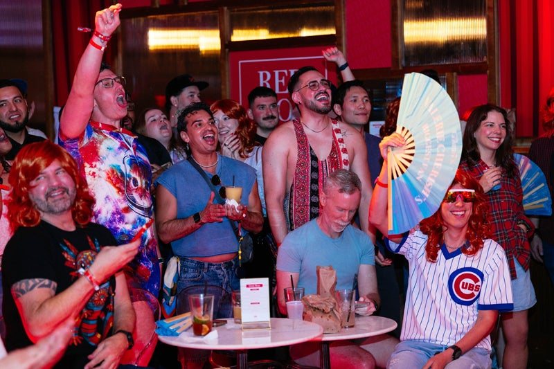 The crowd at HBO's The Comeback brunch at SXSW waving Daftboy fans