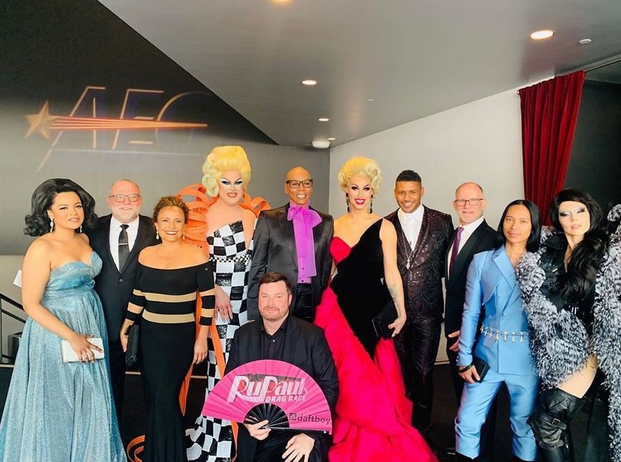 The cast of RuPaul's Drag Race with a Daftboy Drag Race fan