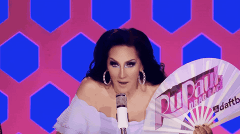 Michelle Visage snapping open a Daftboy fan on RuPaul's Drag Race