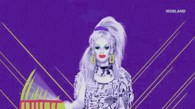 A drag queen snapping a Daftboy clack fan on VICELAND