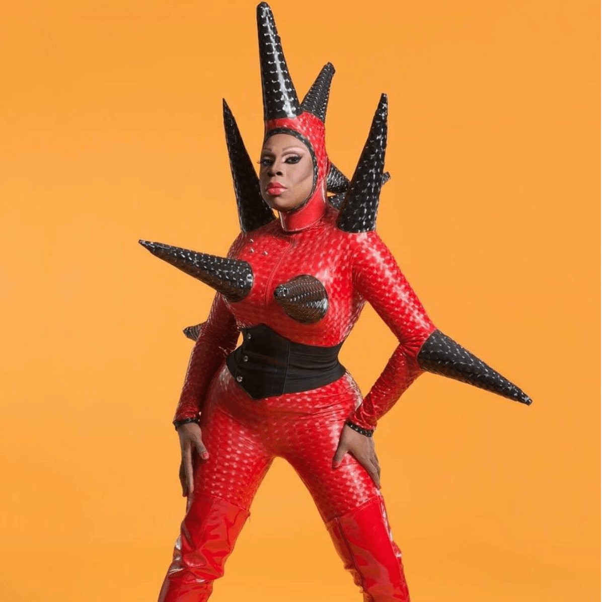 NYC drag legend Vivacious in a red spiked look for a Daftboy interview