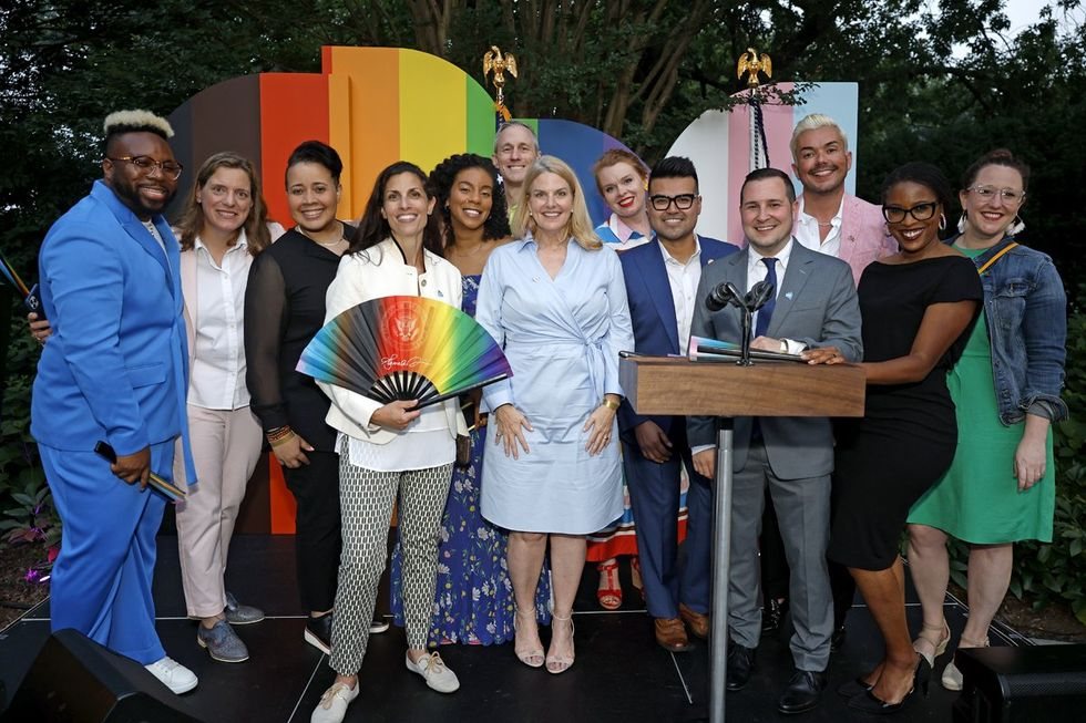 Group photo at the Vice President's Pride reception with Daftboy rainbow fans
