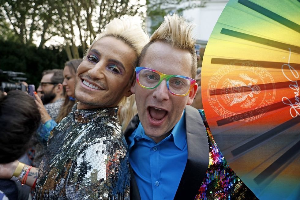 Guests at the Vice President's Pride reception celebrating with a Daftboy fan